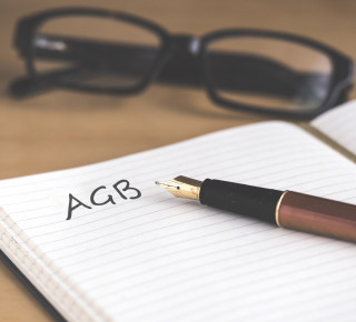 Notebook with writing AGB