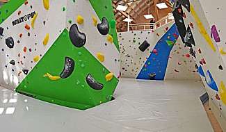 Indoor climbing wall with colourful holds