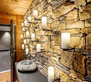 Rustic stone wall with light