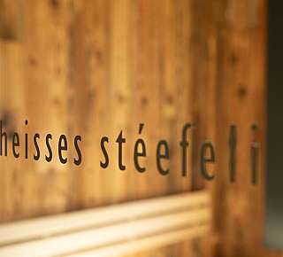 Wooden wall with lettering