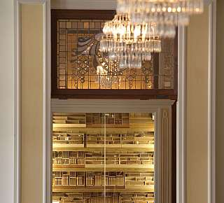 Elegant bookcase behind glass