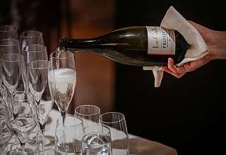 Sparkling wine is being poured