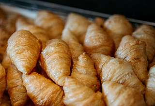 Fresh croissants in a basket