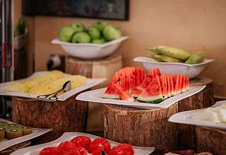 Fruit platters on wooden stands