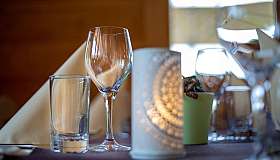 Glasses on a laid table