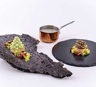 Gourmet dish on slate plates