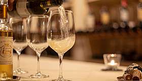 White wine is being poured