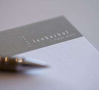 Visitenkarte mit Stift