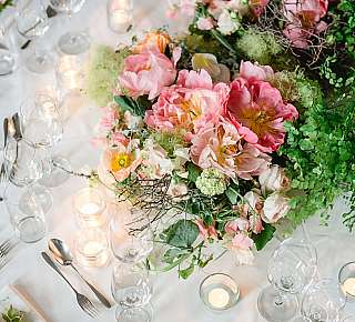 Flower arrangement on a festively laid table