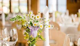 Floral arrangement on a festively laid table