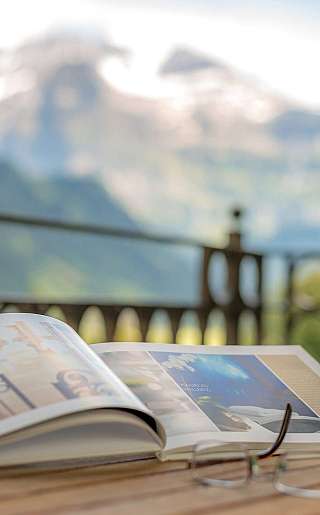 Book and coffee on terrace
