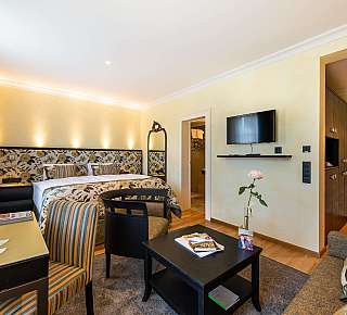 Cosy hotel room with television