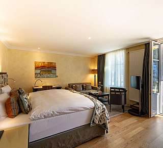 Bright hotel room with mountain view