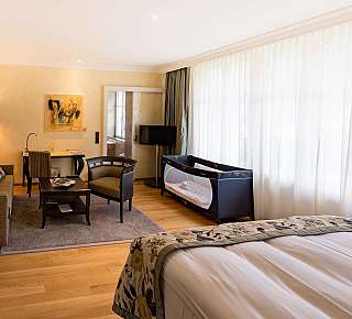 Bright hotel room with seating area