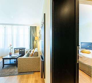 Bright bedroom with seating area
