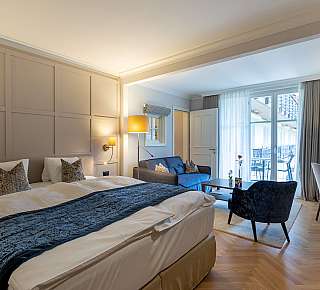 Cosy hotel room with seating area